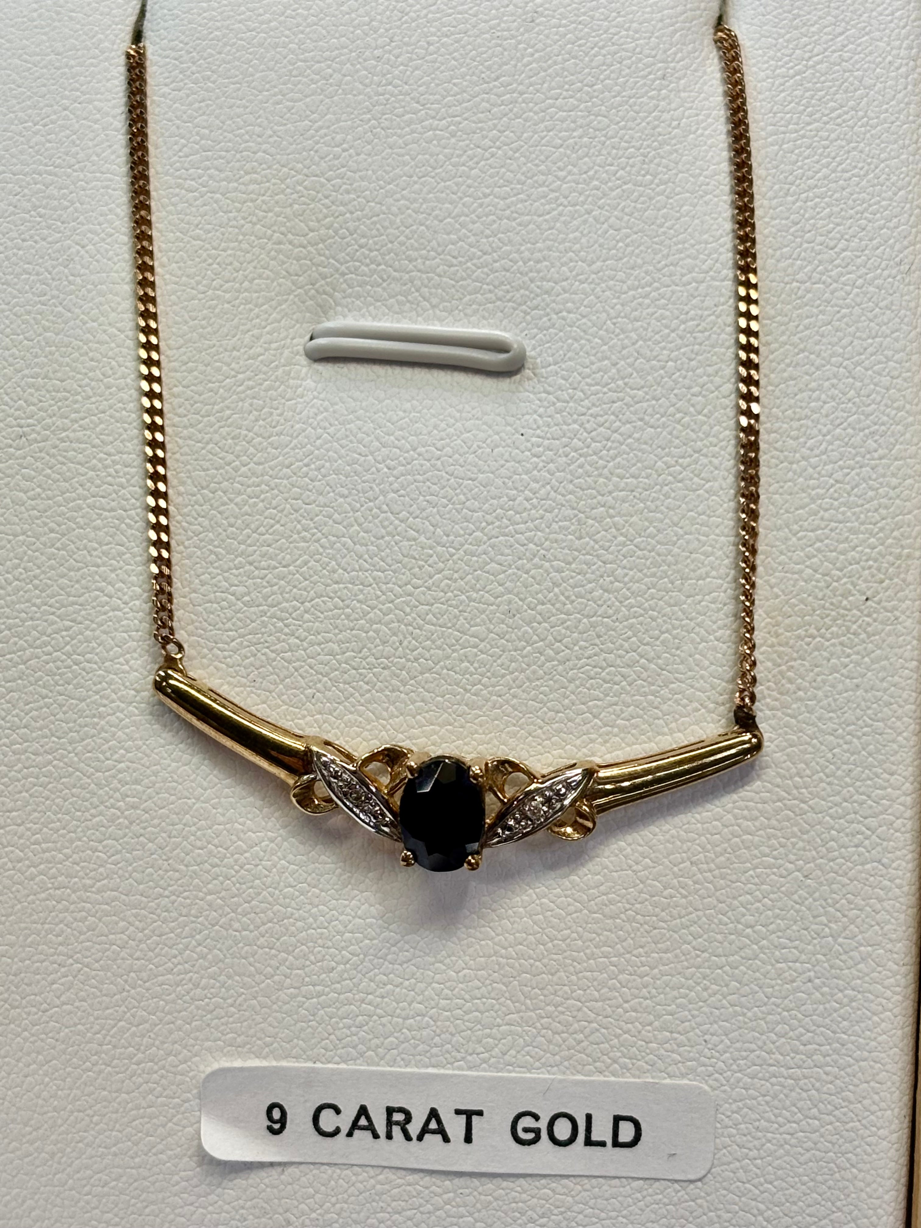 9ct gold sapphire and diamond necklass
